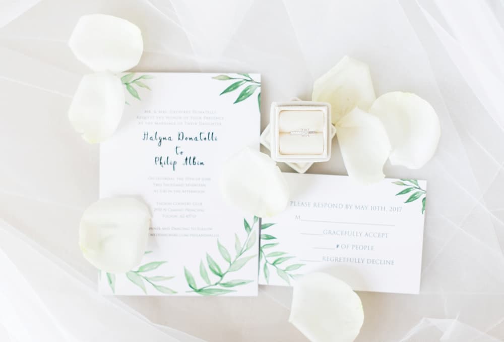 white and green wedding invitation