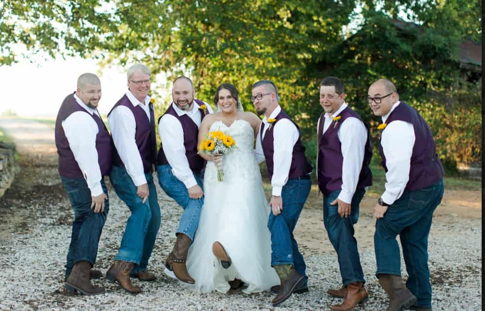 bride and groomsmen wearing country boots
