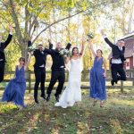 bridal party jumping for photos