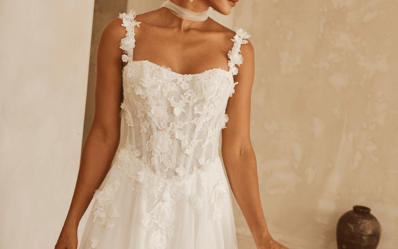model wearing a square neckline wedding dress