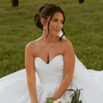 bride sitting on a beautifule wedding dress