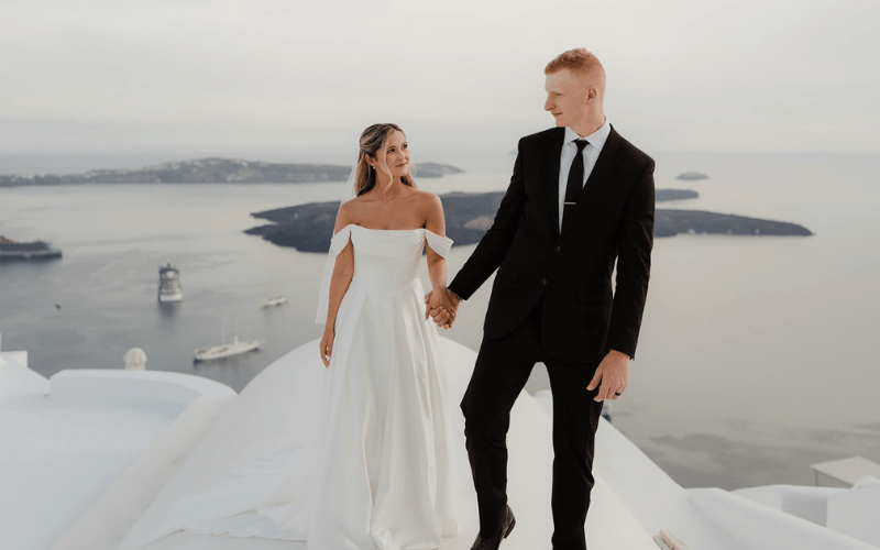 couple taking picture at the beach