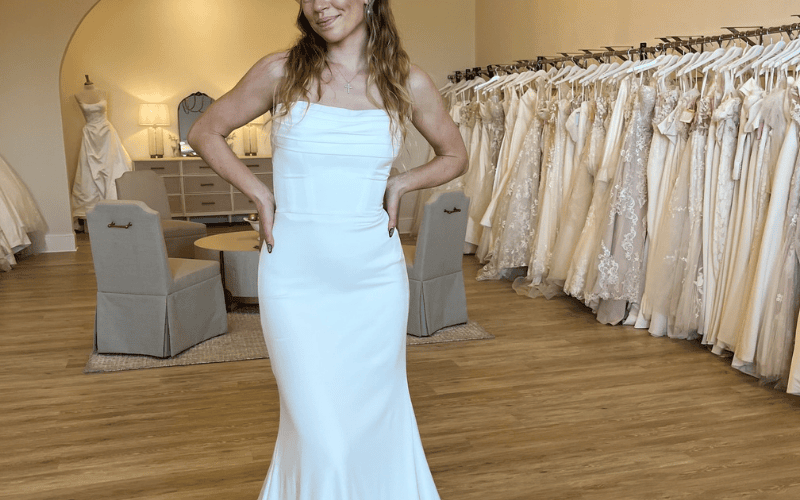 bride at Ashley Grace bridal wearing a minimal wedding dress