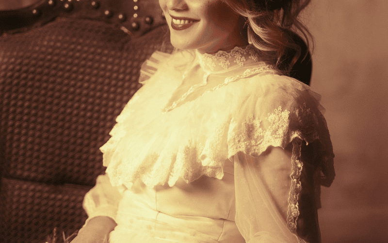 a woman in 1930s wearing a gown