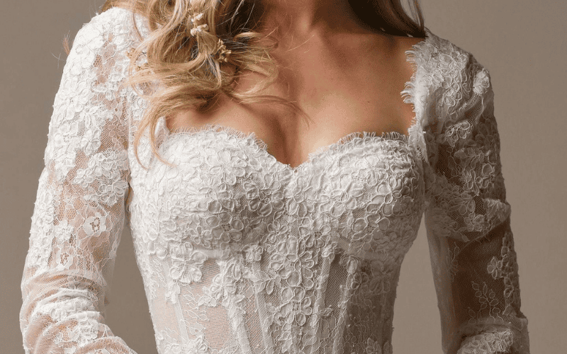 bride wearing a long sleeve gown with romantic details