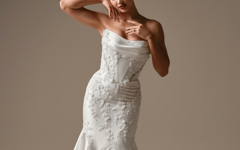 bride wearing a satin gown with romantic details