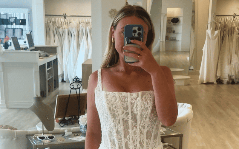 bride taking a mirror selfie