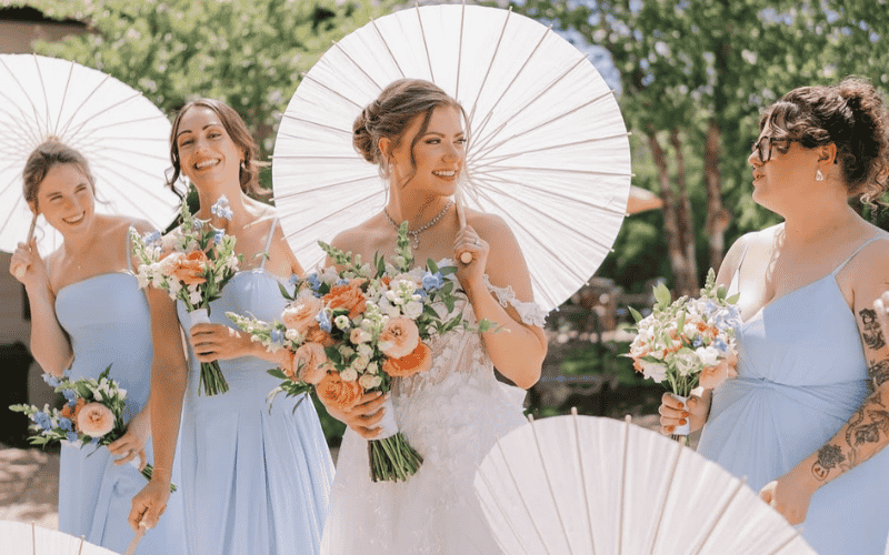 confident bride, bride holding an umbrella