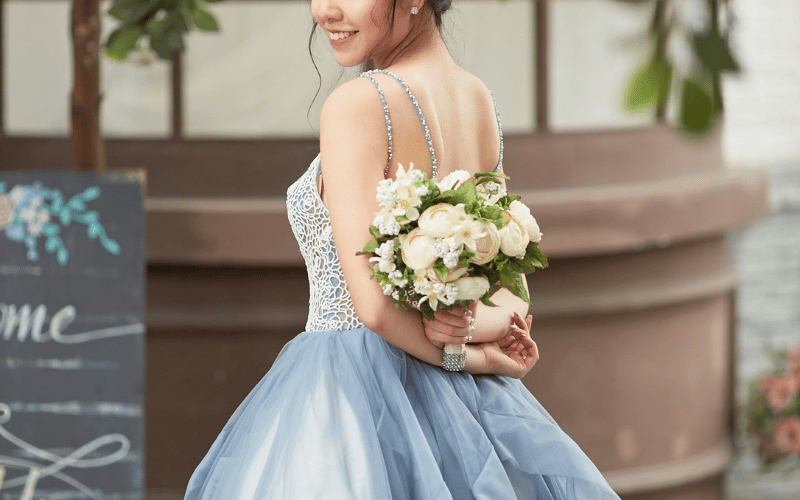 bride wearing soft blue color