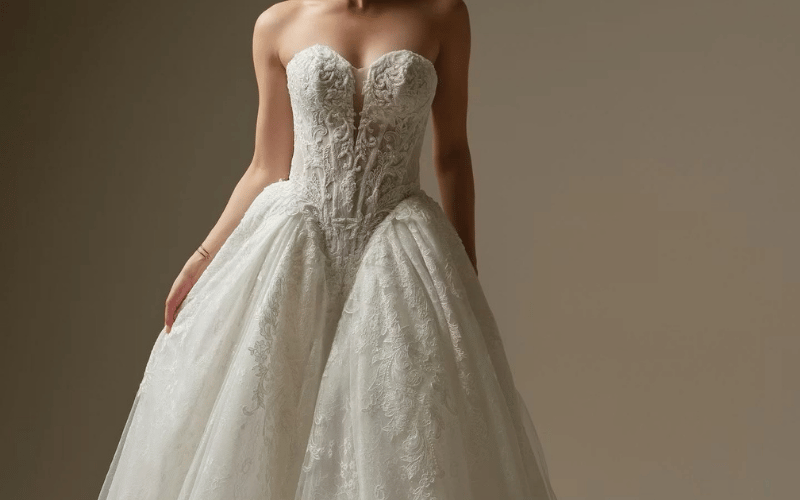 bride wearing basque waist wedding gown